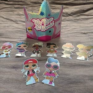 LOL doll party decorations. Cardboard glitter sign and dolls. Good for birthday.